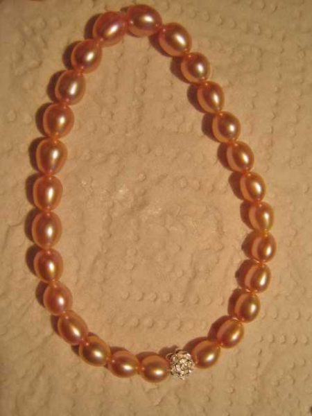 Armband Süßwasserperlen oval 6-7mm lachsfarben mit Rose 925er Silber