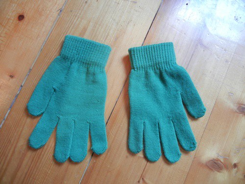grüne Handschuhe