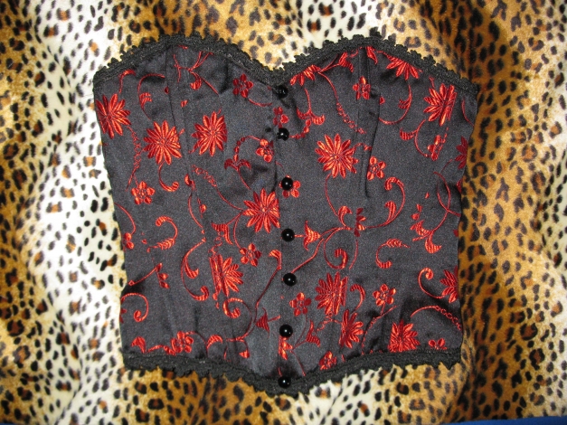 corsage schwarz rot ornamente