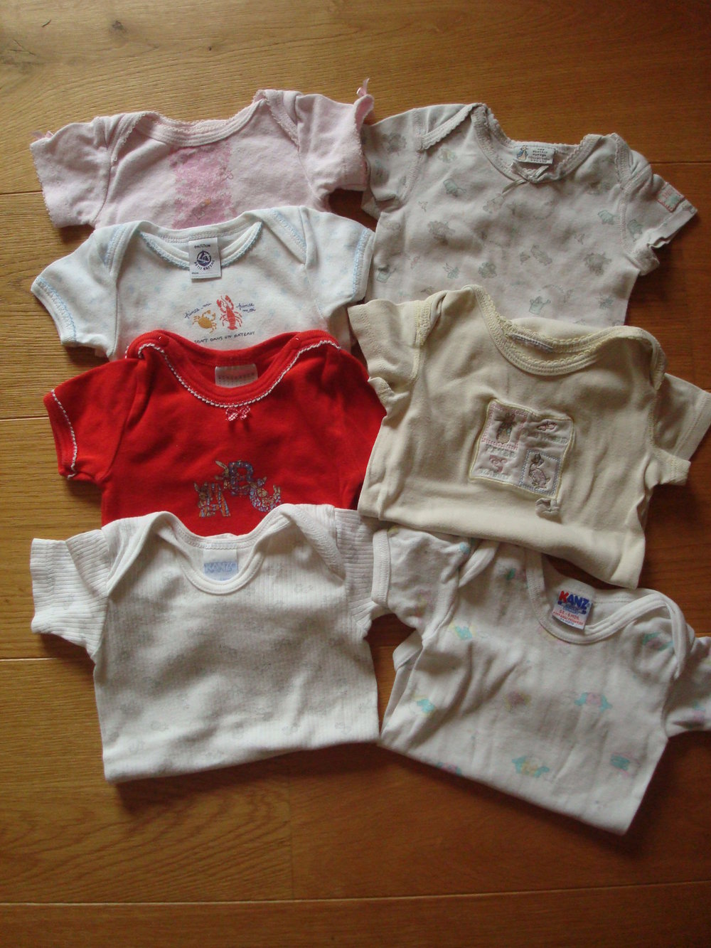 7 Kurzarmbodys für Mädchen Gr. 62
