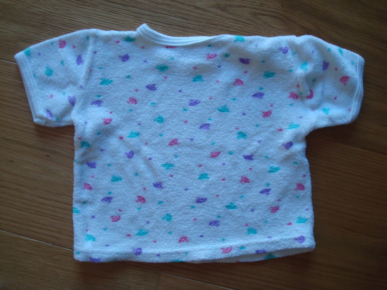 2 Kurzarmshirts / T-Shirts Gr. 62