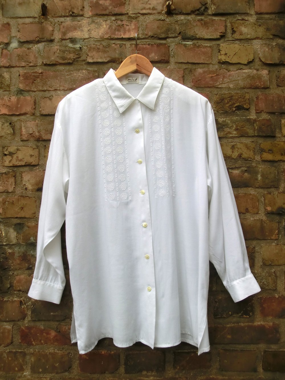 Weiße Bluse Stickmuster