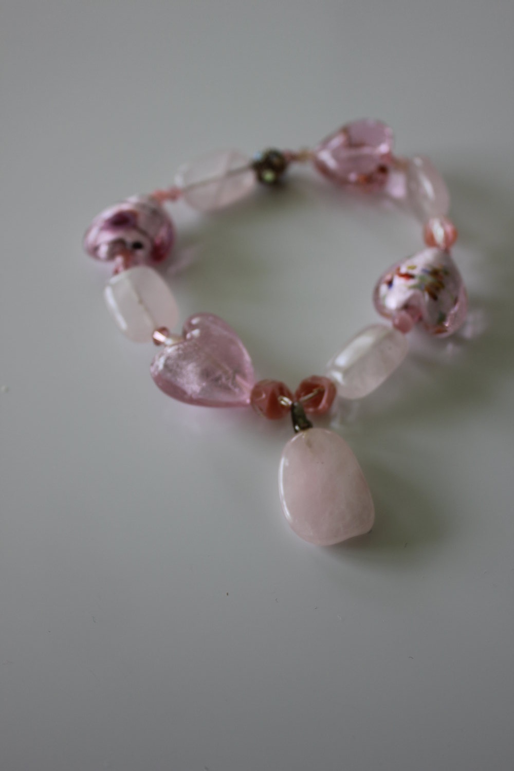 rosa Armband mit Anhänger