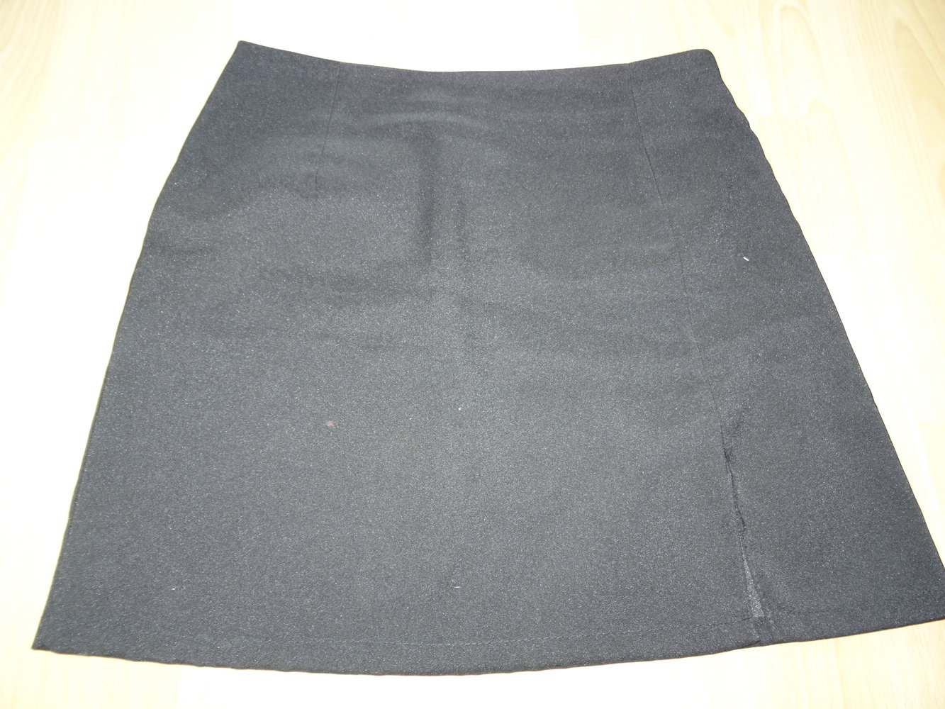 Minirock schwarz geschlitzt Gr. 34