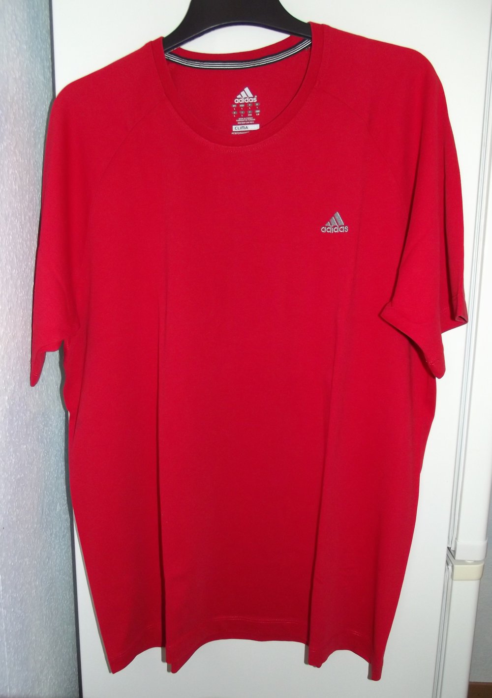 Sehr schönes neuwertiges Adidas Shirt Gr. L