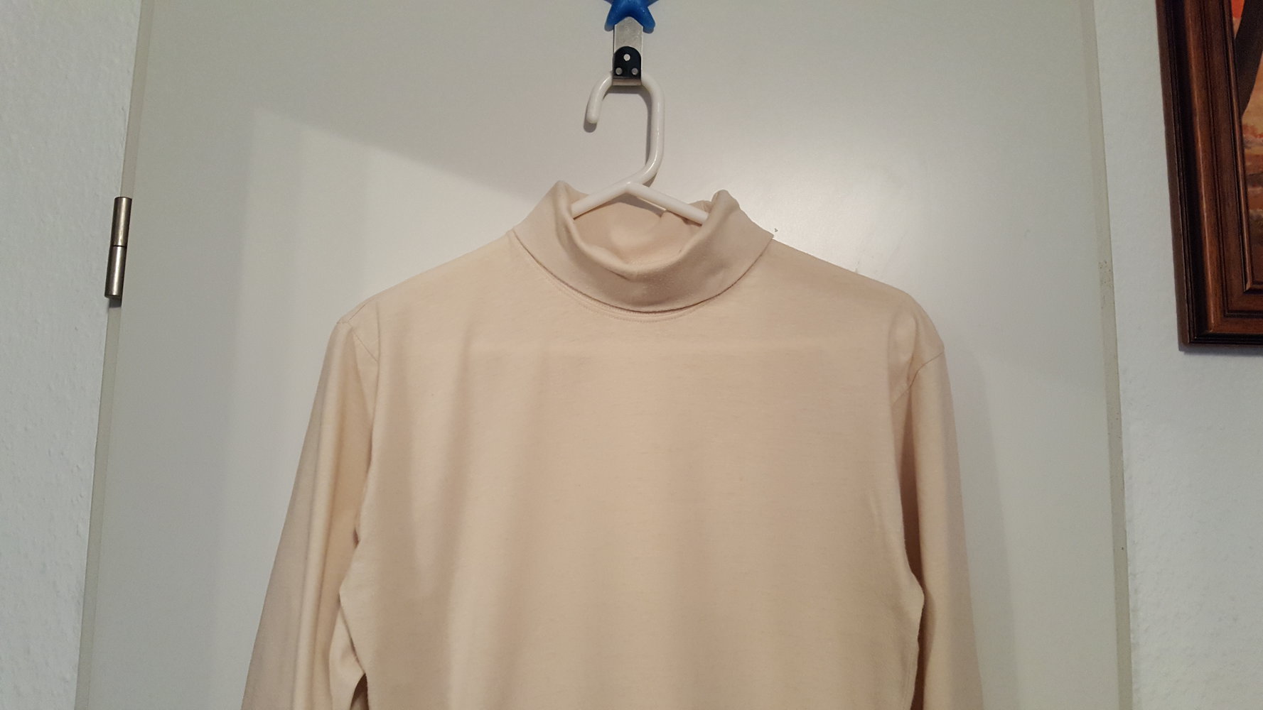377. Rollkragenpulli von Formicula/Frankreich, Gr. 152, beige