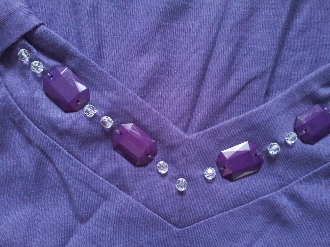  Shirt lila Gr. 52 Steine Perlen