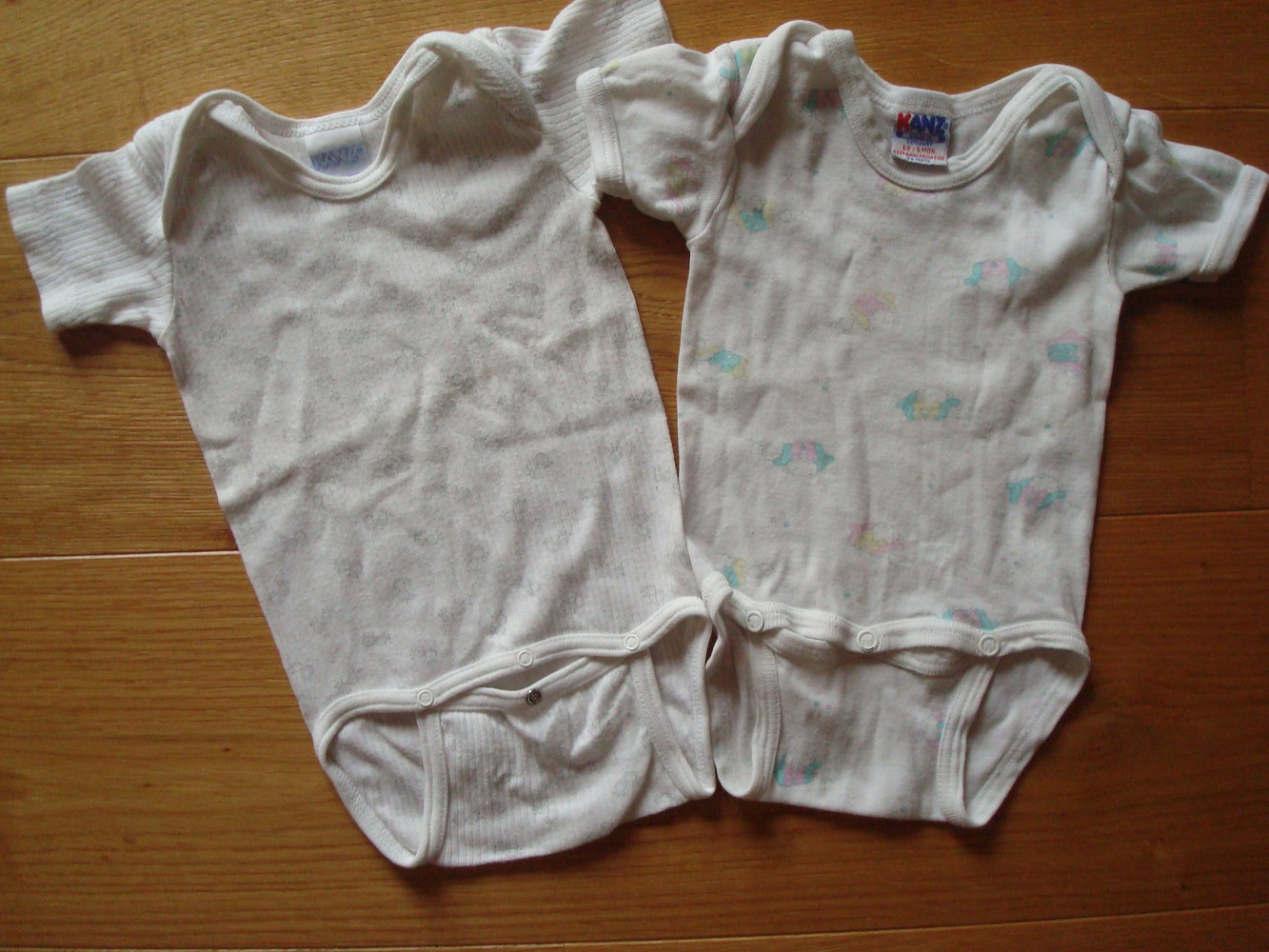 7 Kurzarmbodys für Mädchen Gr. 62