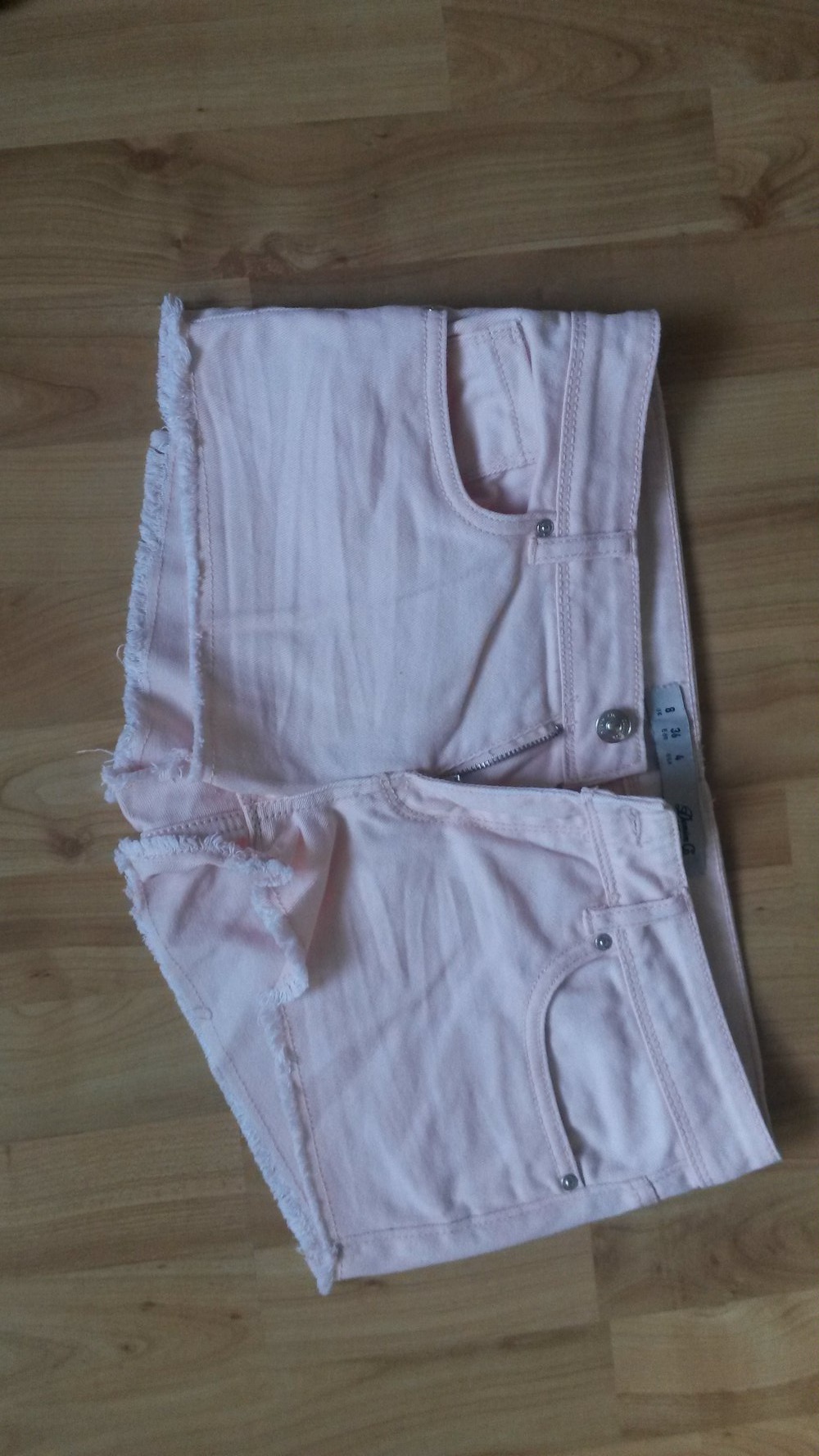 Hellrosa Hotpants mit Fransen Gr. 36