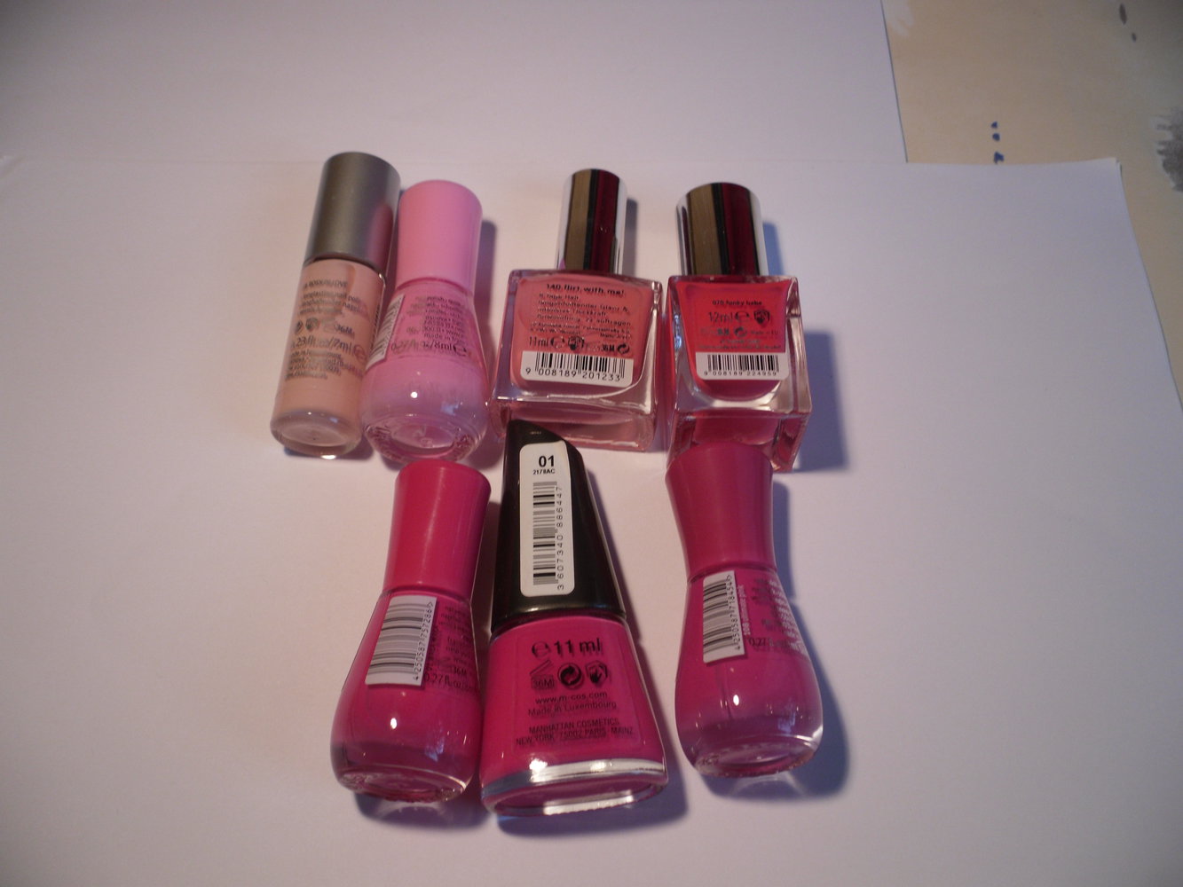 4 Nagellacke in Rosa- und Pinktönen