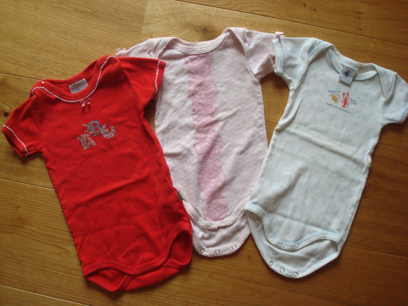 7 Kurzarmbodys für Mädchen Gr. 62