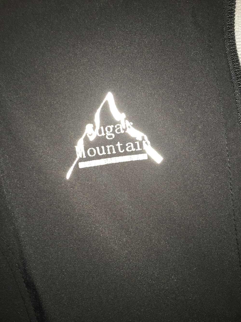 schwarze Wind- und Wetterjacke für Kids