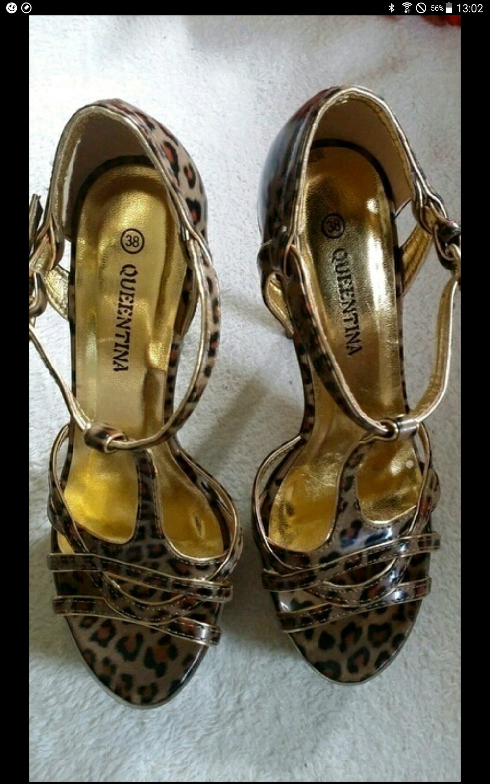Top stylisch inszenierte Peeptoes Riemchen -Stilettoheels im Leo-Look