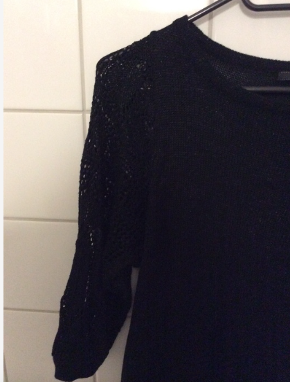 Schwarzer Pullover mit Schimmer