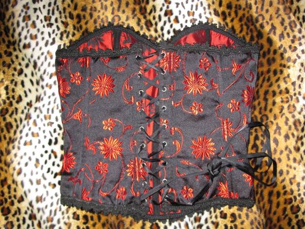 corsage schwarz rot ornamente