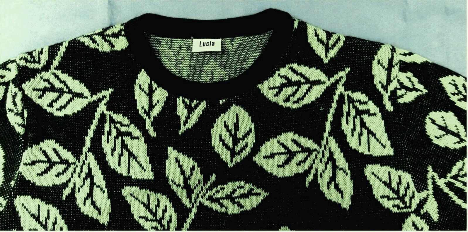 Damen-Pullover von Lucia - dunkelgrün mit hellgrünem Blätter-Motiv - Größe 42