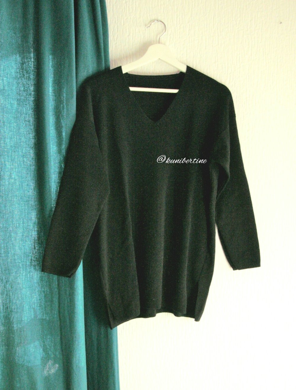 Schwarzer Pullover V-Ausschnitt