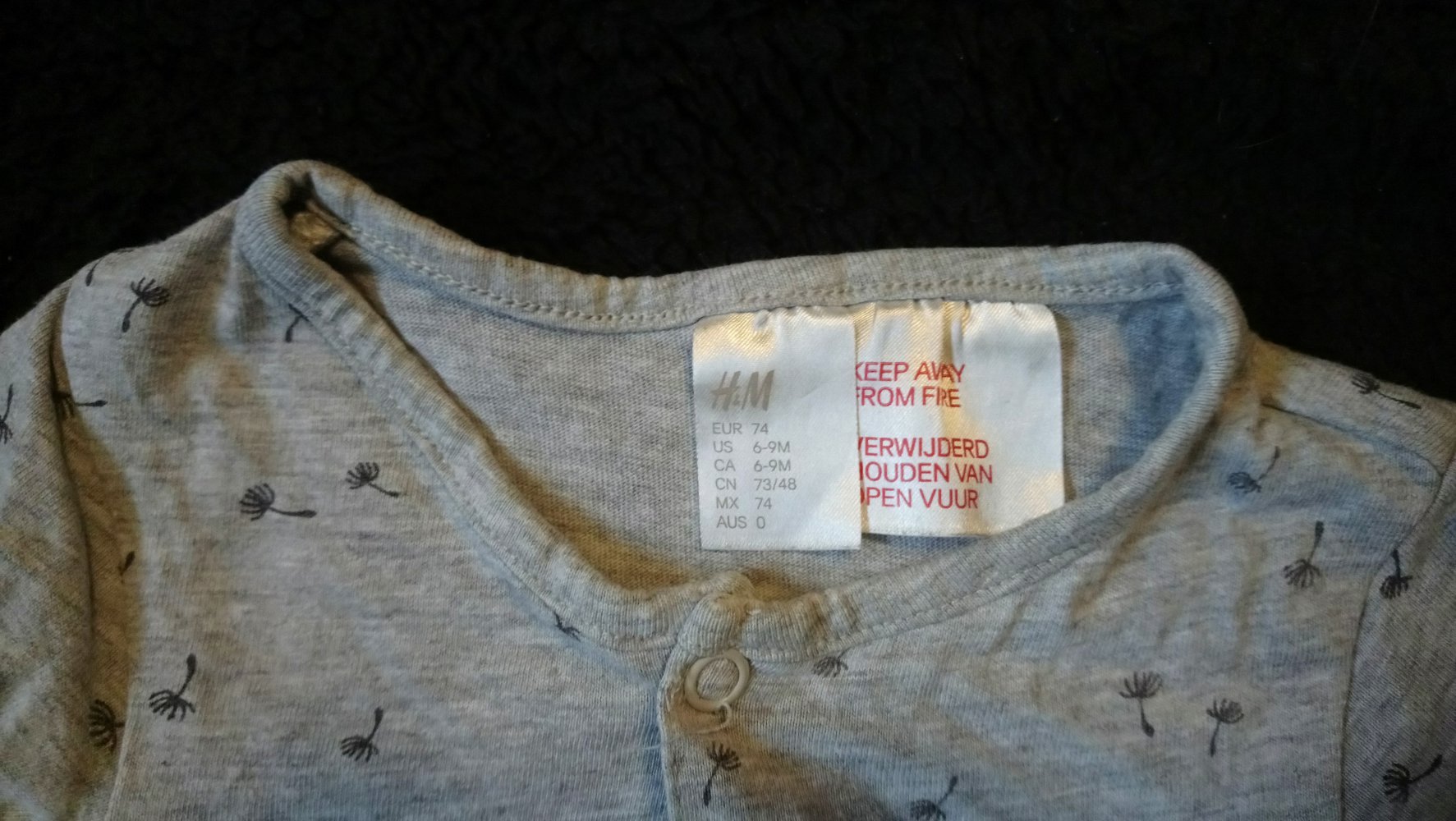 Einteiler Spieler H&M 74 grau Pusteblume