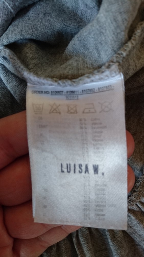 sehr schönes Sommershirt in Gr.110 von Dopodopo Girls in hellgrau mit Schöschen