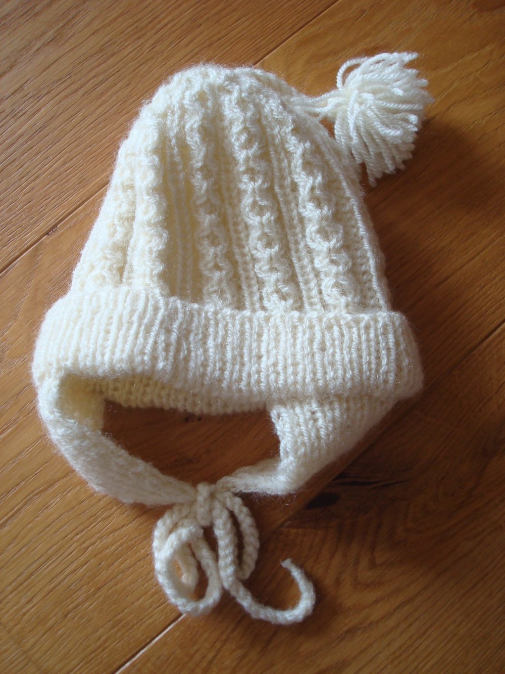 Mütze mit Ohrenklappen, Strickmütze handmade