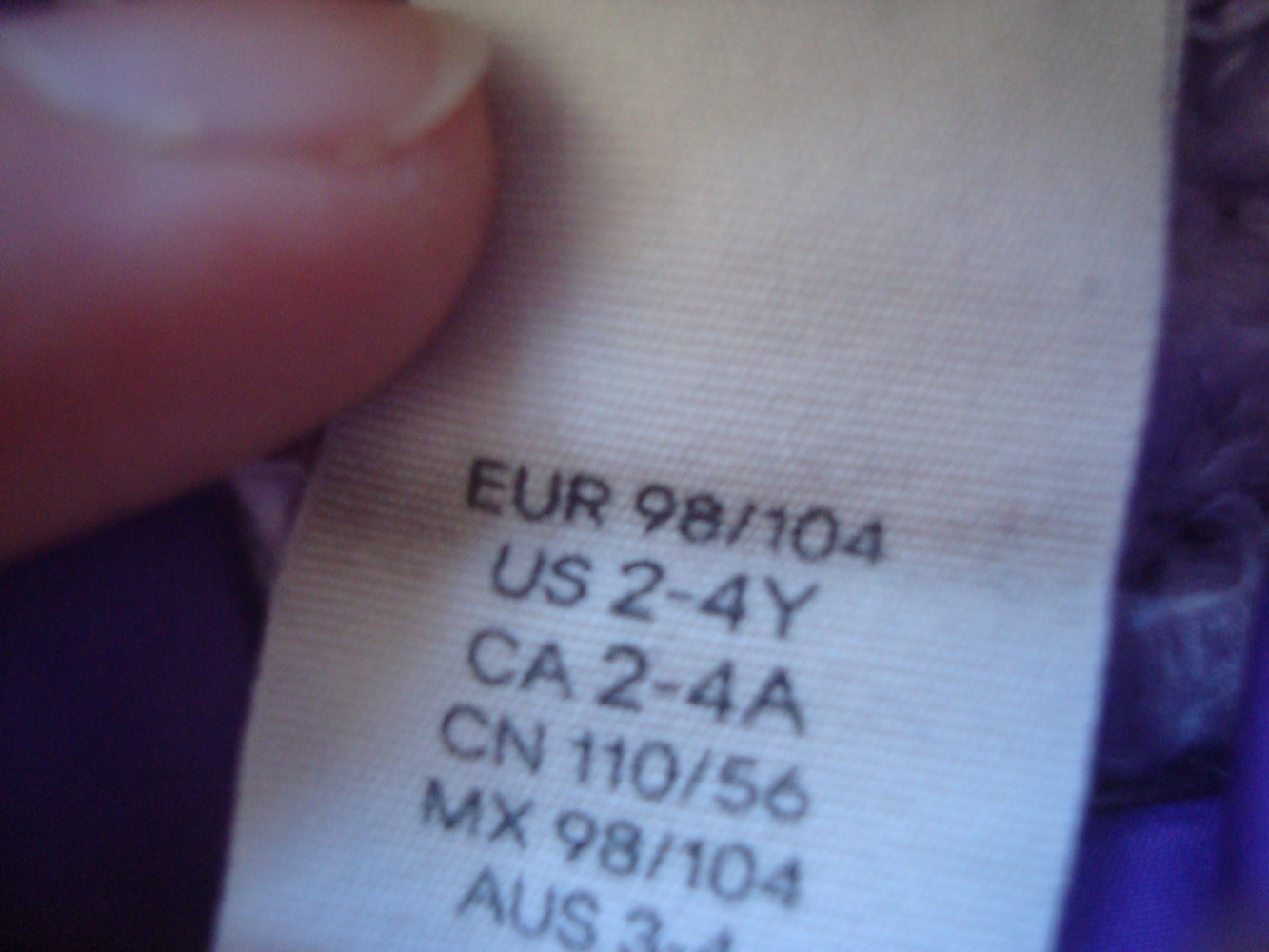 süße flauschige Strickjacke in Lila