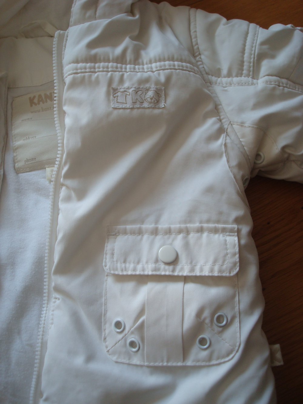 schöne Winterjacke, Jacke mit Kapuze in Weiß / Creme von Kanz