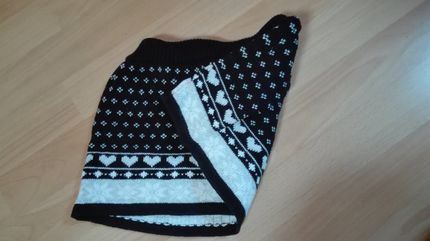 Schwarz grau gemusterter Strickrock Gr. 92/98