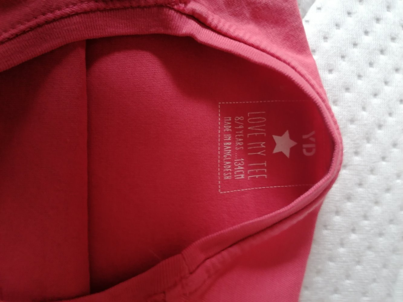Young Dimension: roséfarbenes Langamrshirt mit Federn Gr. 134