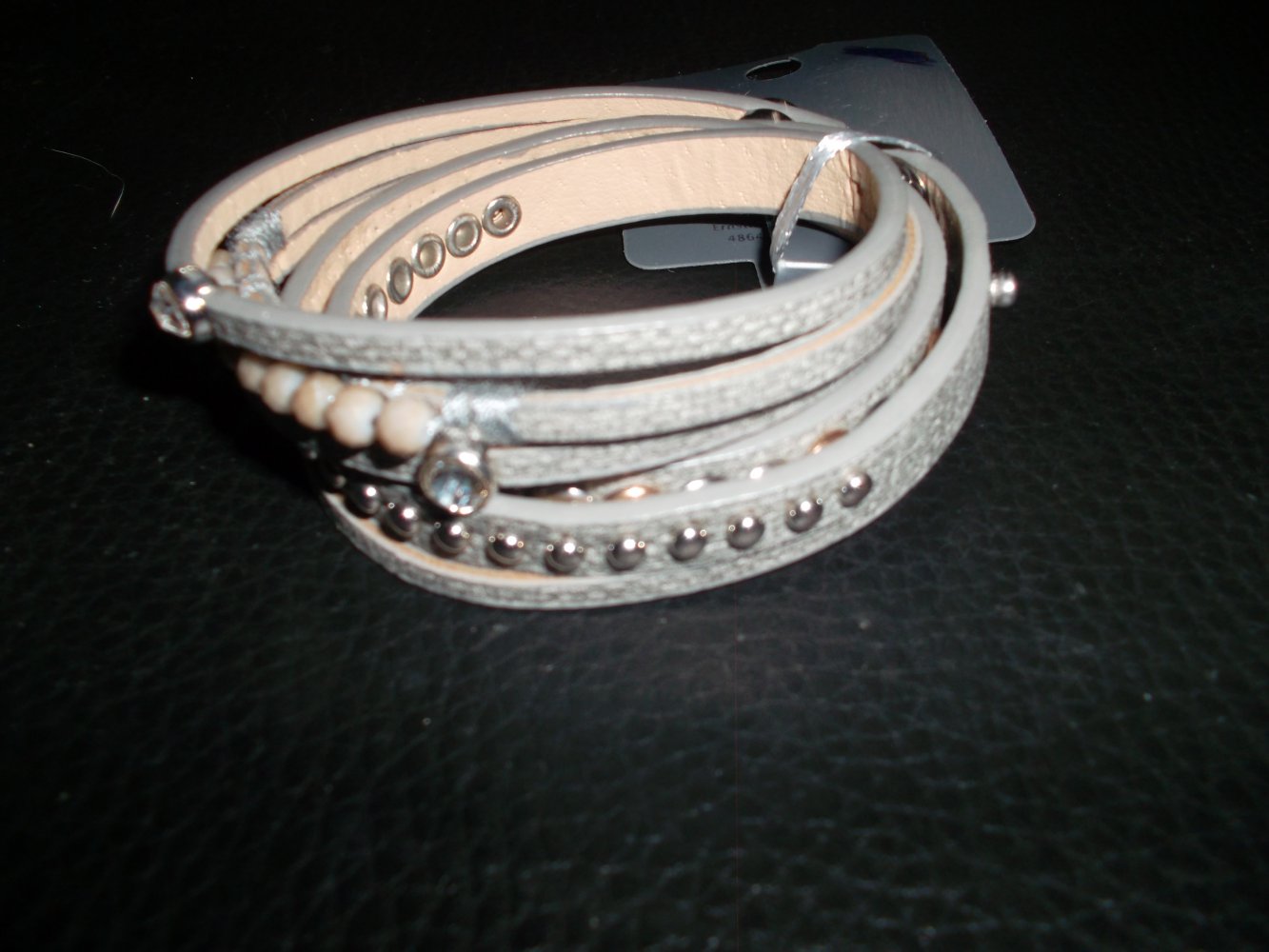 neues armband.gina benotti.grau.steinchen.verstellbar