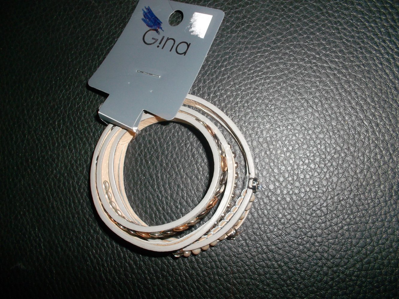 neues armband.gina benotti.grau.steinchen.verstellbar
