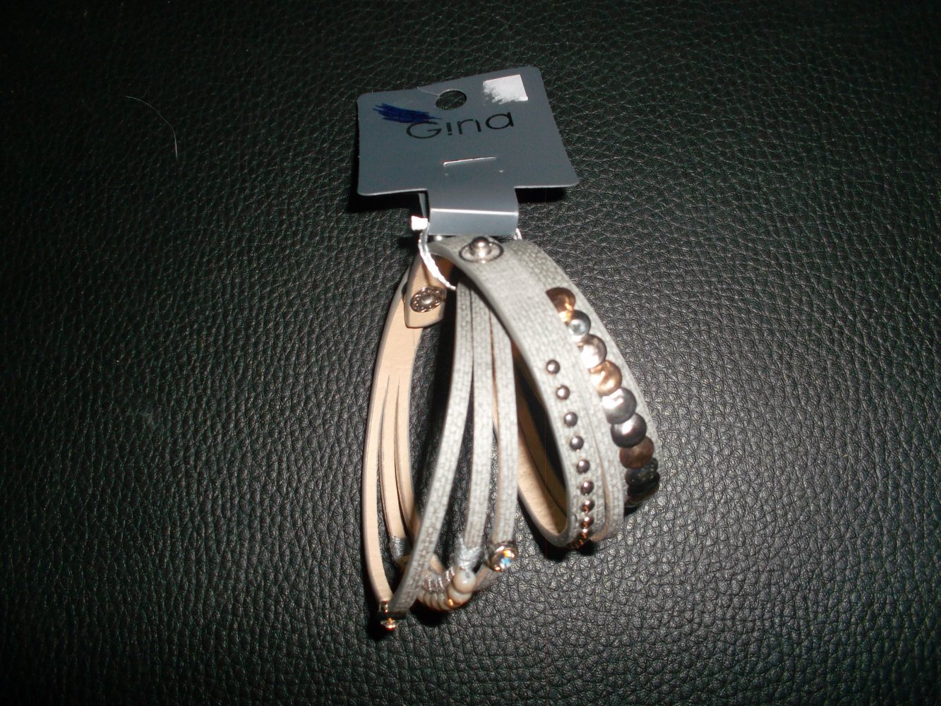 neues armband.gina benotti.grau.steinchen.verstellbar