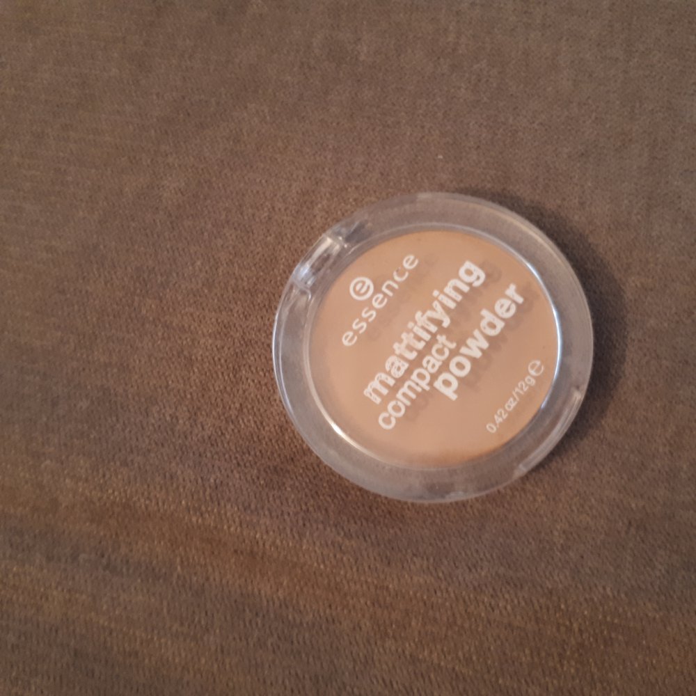 Mattifying compact powder
