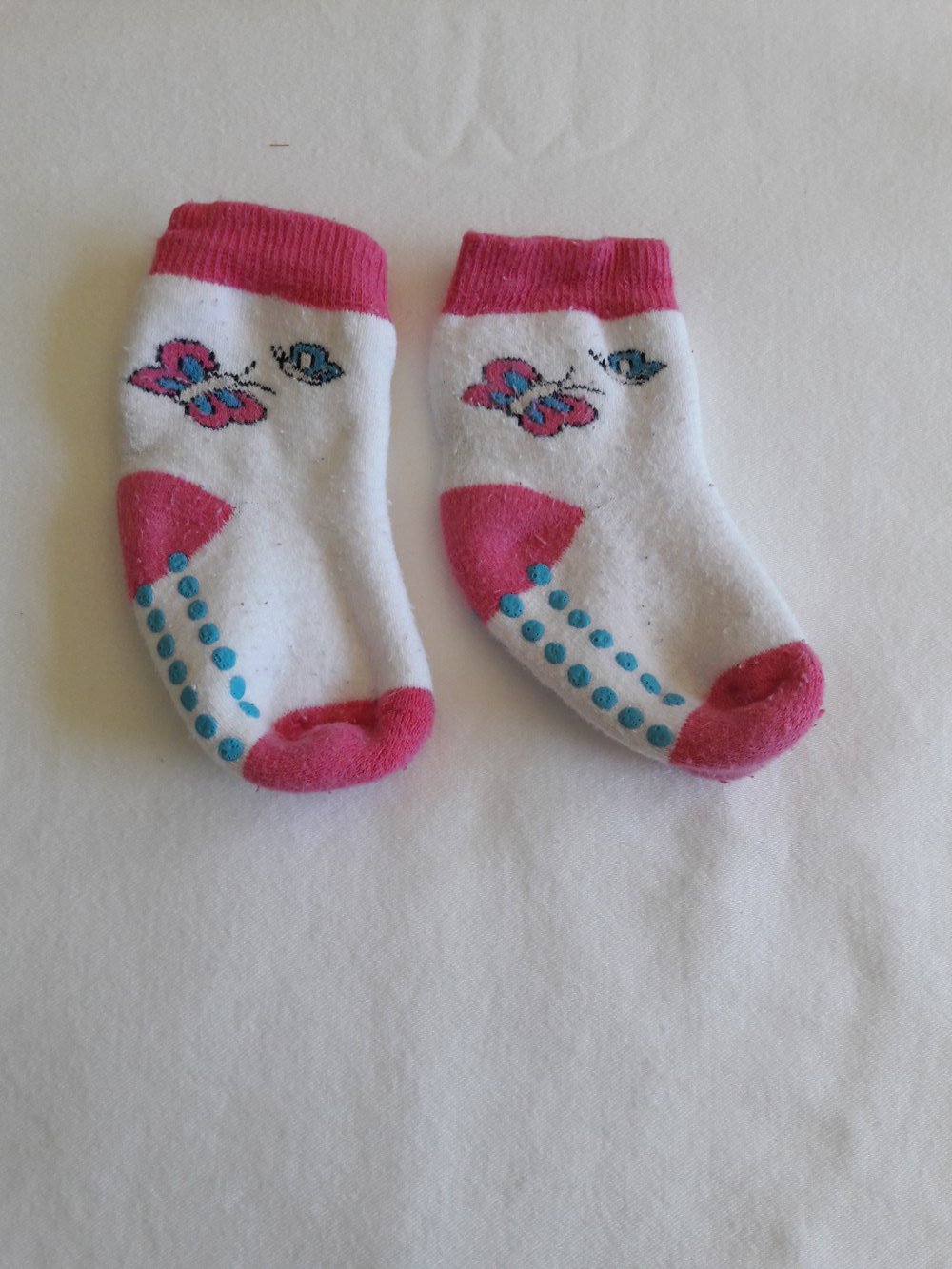 Stoppersocken, pink/weiß mit Schmetterlingen, Gr. 19-22