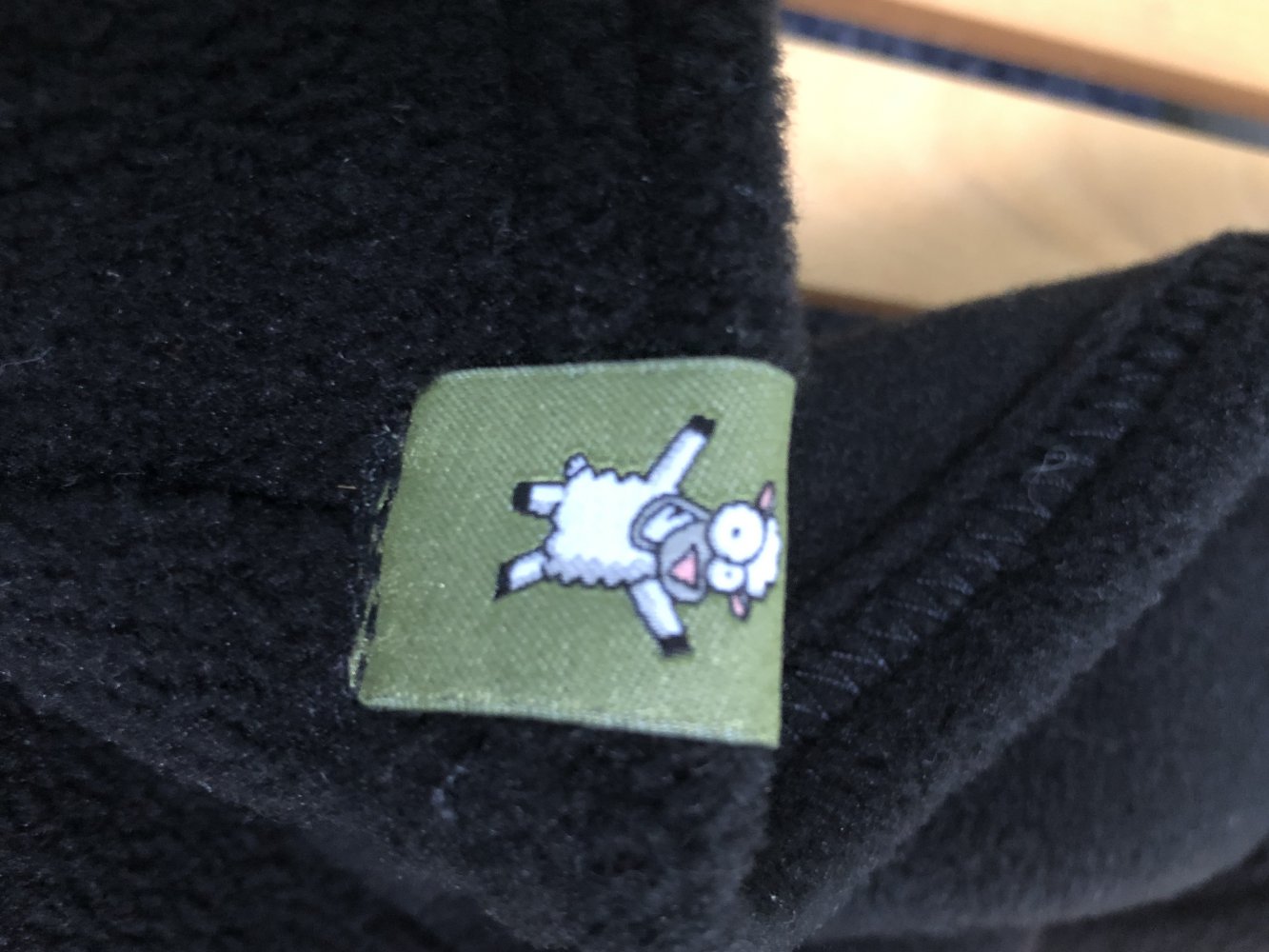 Fleece Tragepullover von Lenny Lamb schwarz Größe L