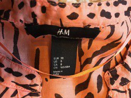 *H&M* Bluse/Tunika Gr.38, orange mit schwarzem Muster