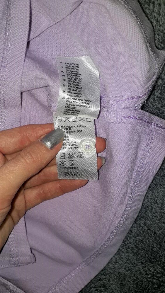 Figurbetontes Poloshirt in Pastellton lila flieder von H&M