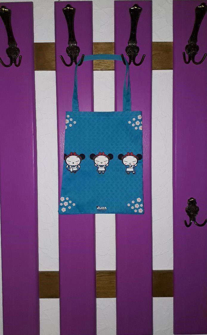 Hellblaue Tasche mit Pucca Design