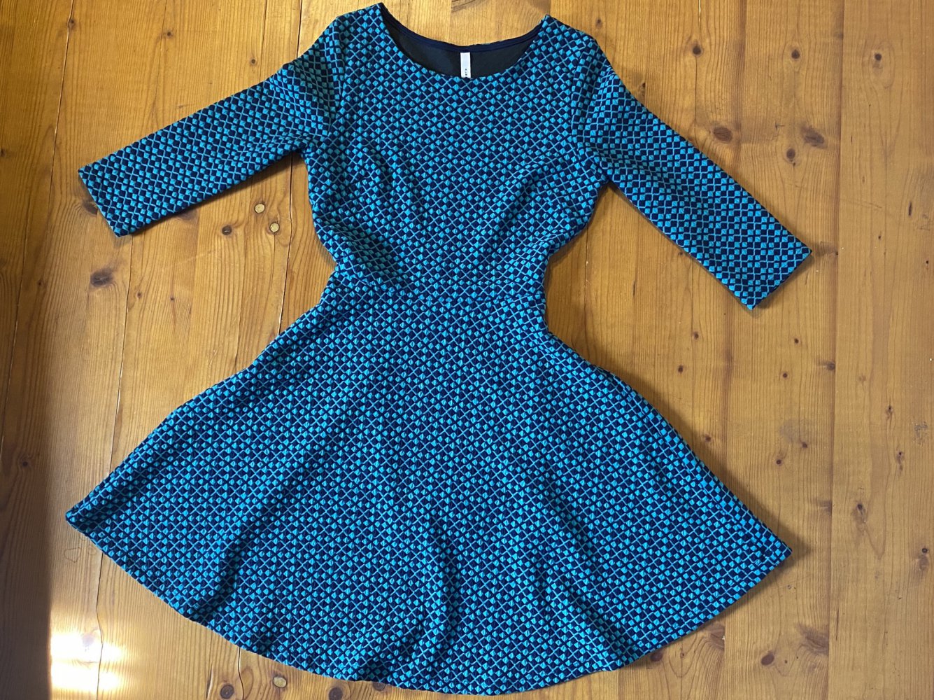 Blaues und grünes Cocktailkleid