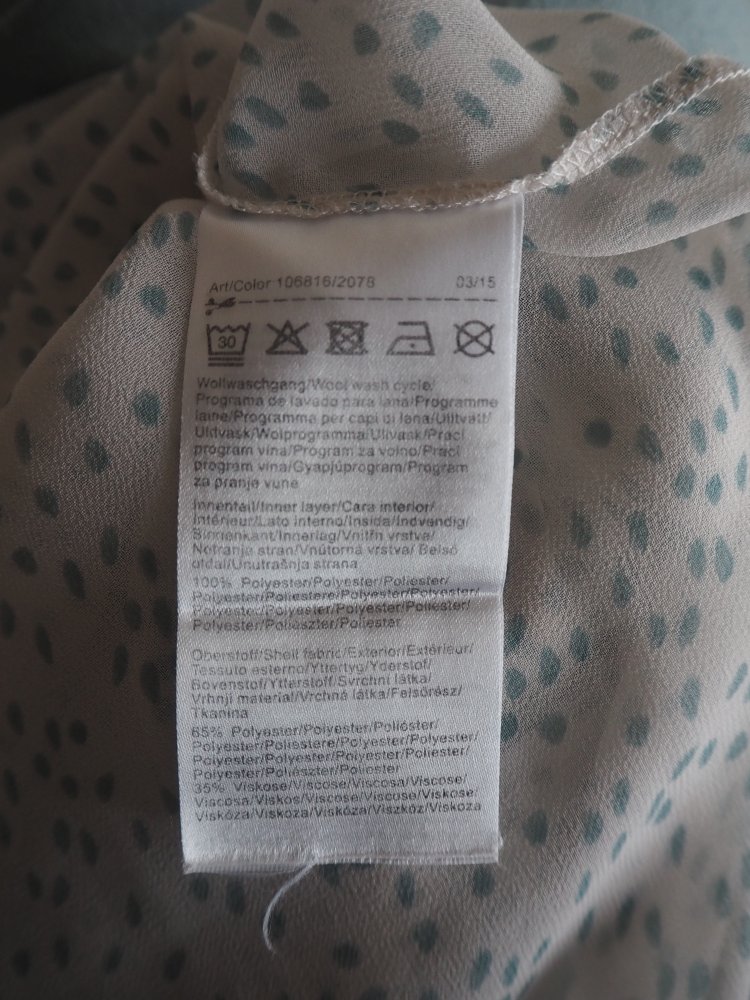 Bluse mit raffiniertem Rücken