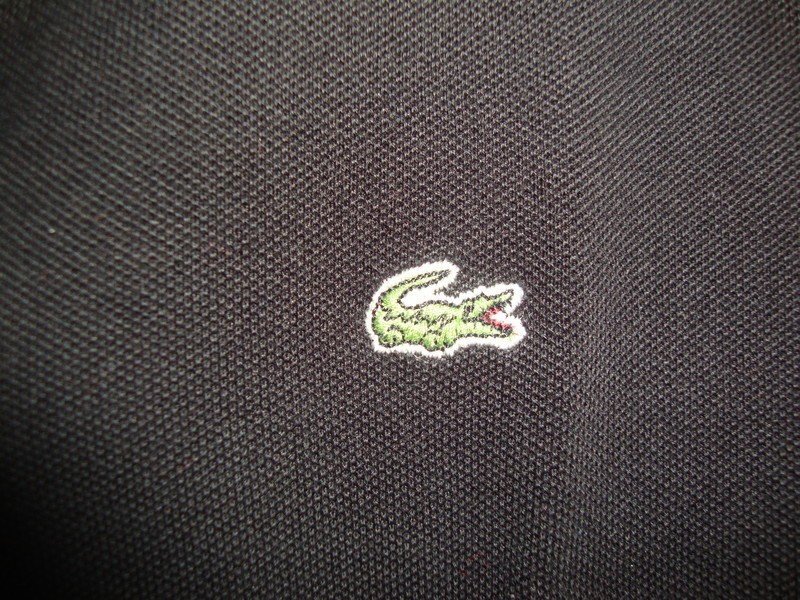 Poloshirt in schwarz von Lacoste