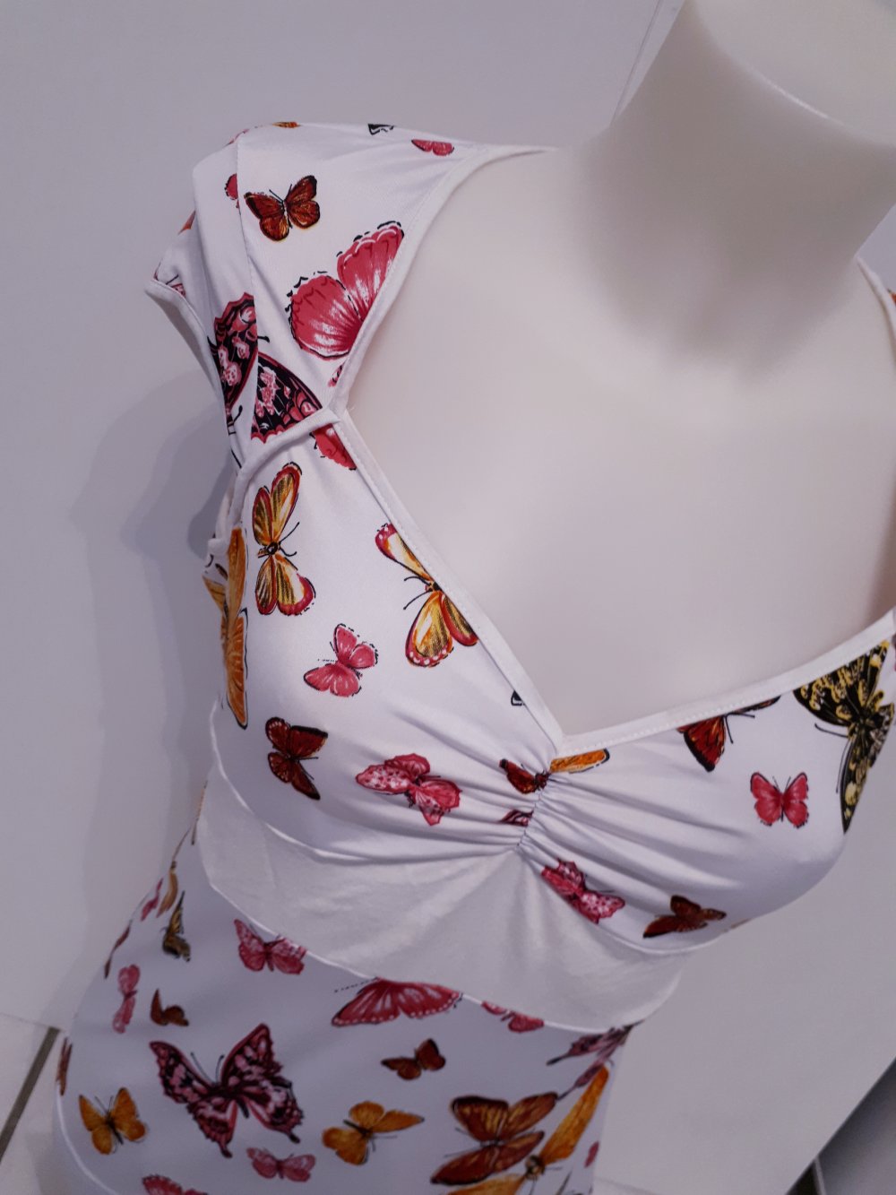 Shirt mit Schmetterlingen und Schleife weiß rosa orange Viskose