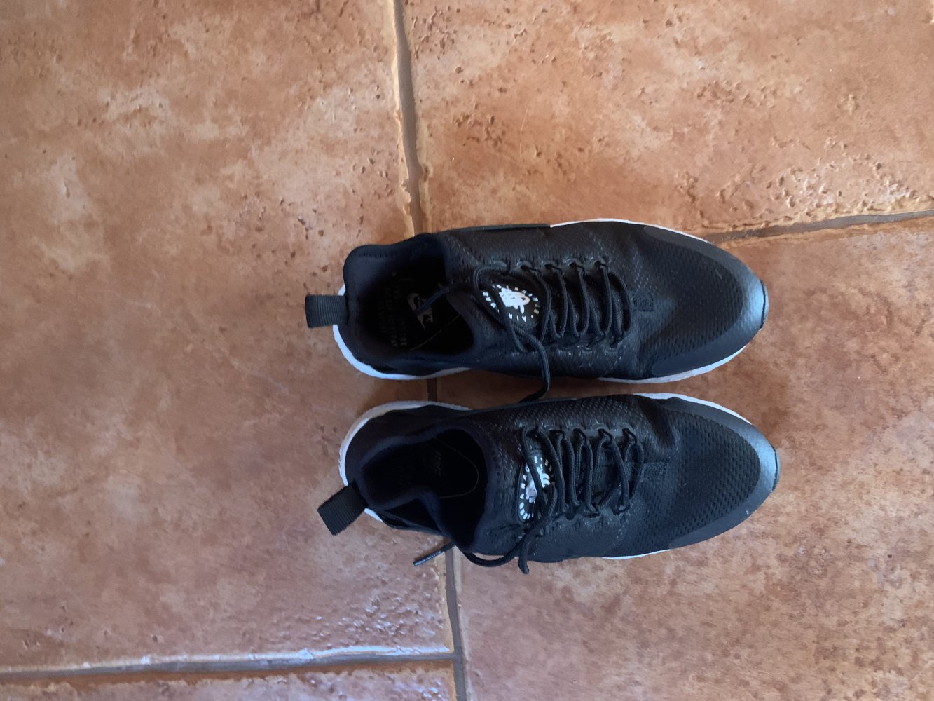 Schwarze Nike Huarache