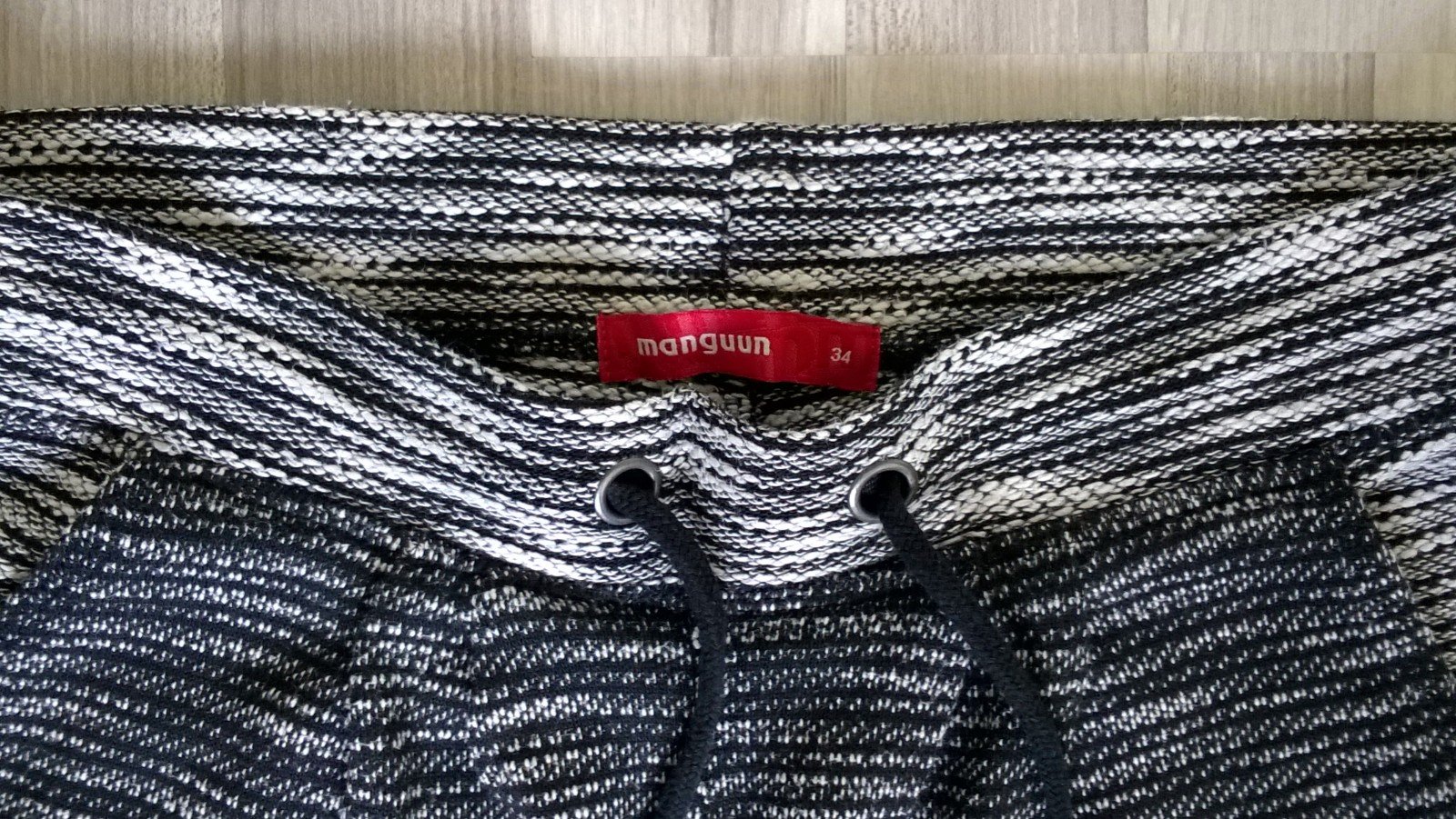 Hose Freizeithose schwarz weiß meliert Strick Gr. 34 Manguun