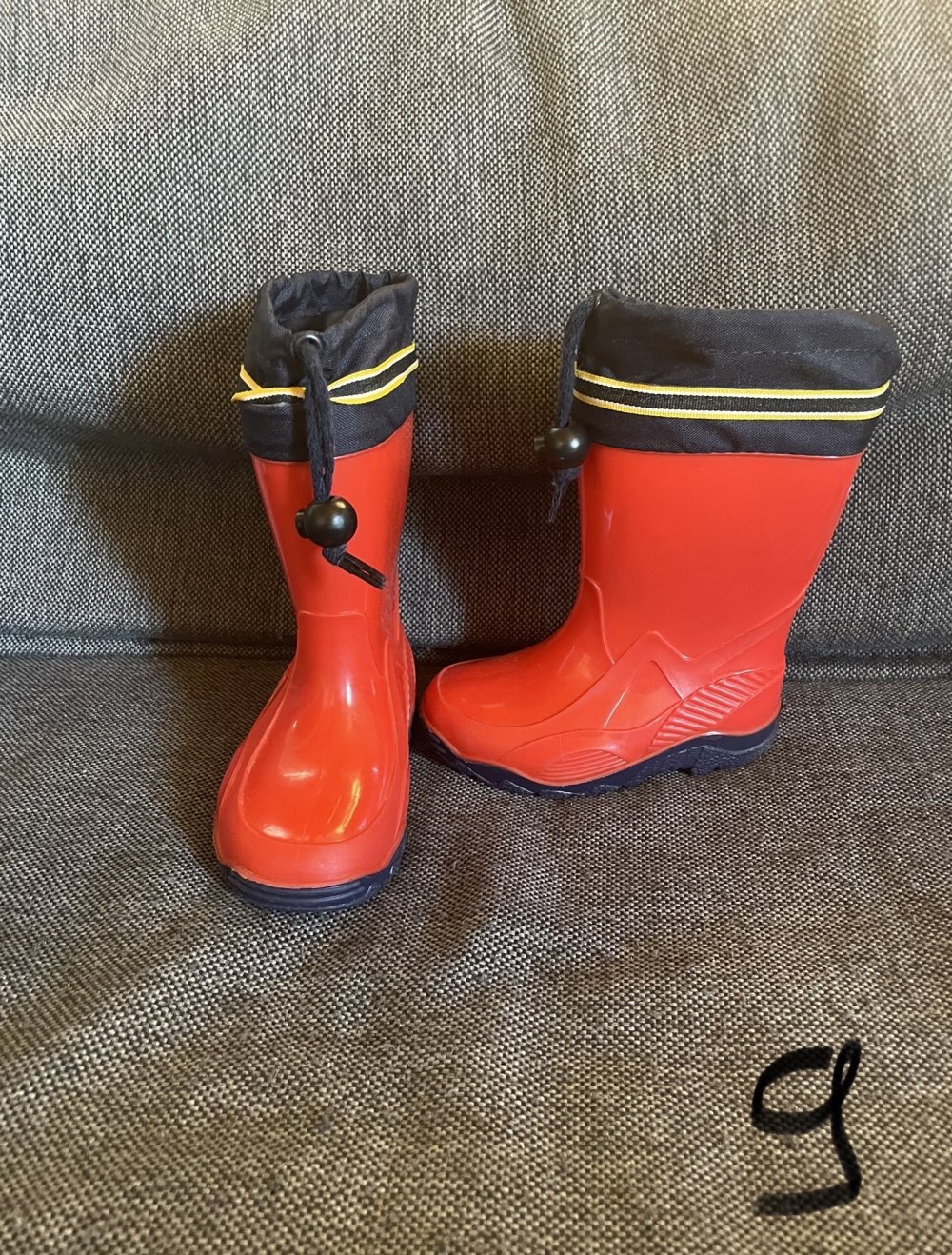 Rote Gummistiefel