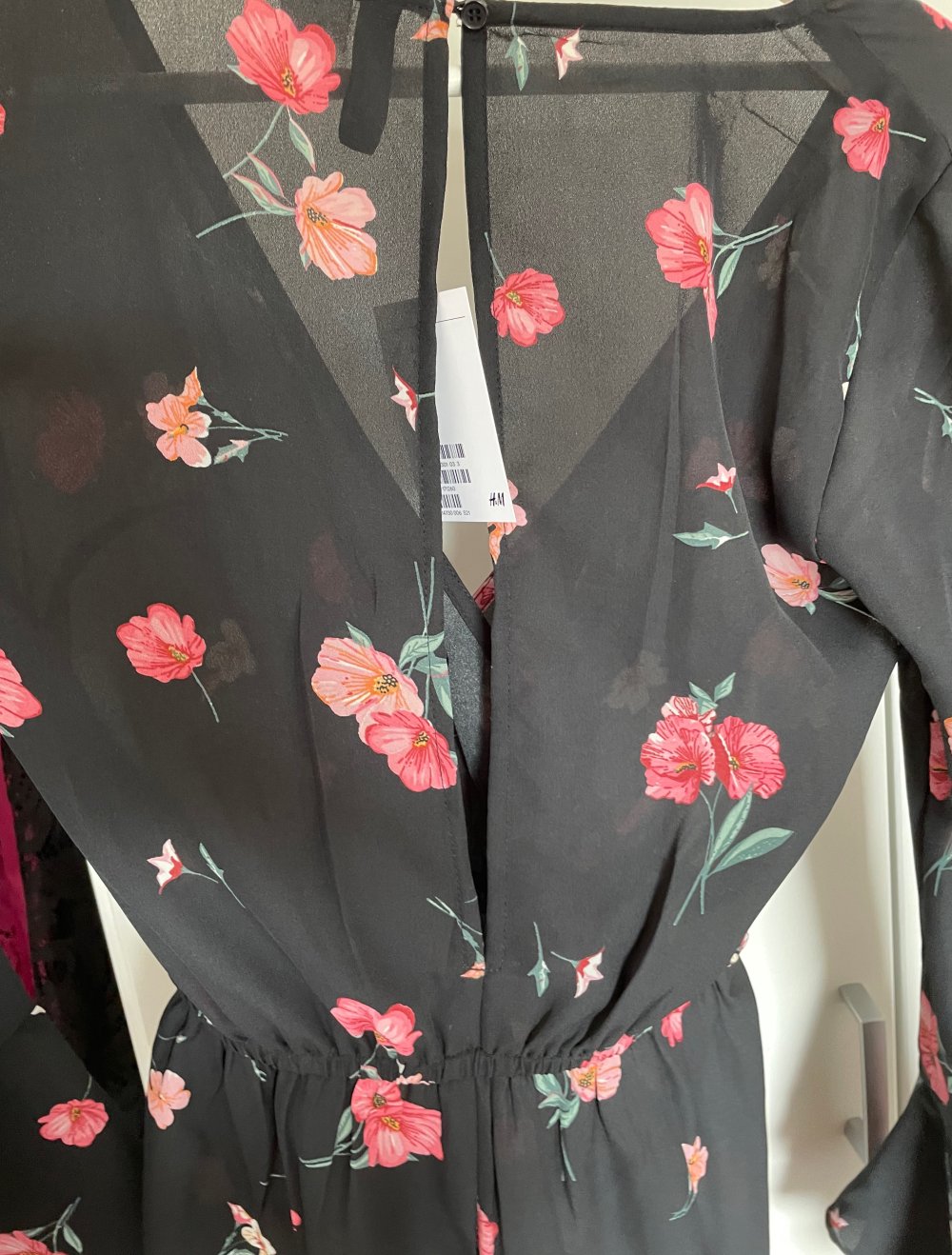 Jumpsuit schwarz mit Blumen