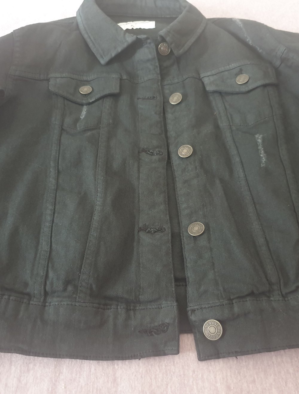 schwarze Jeansjacke