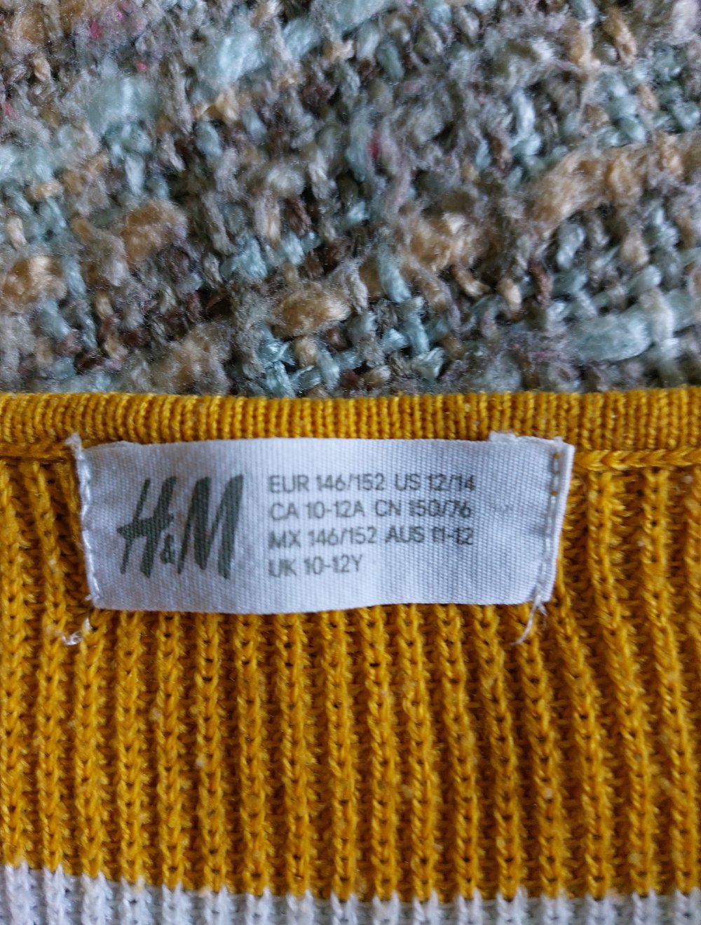 Wollpullover; 4€