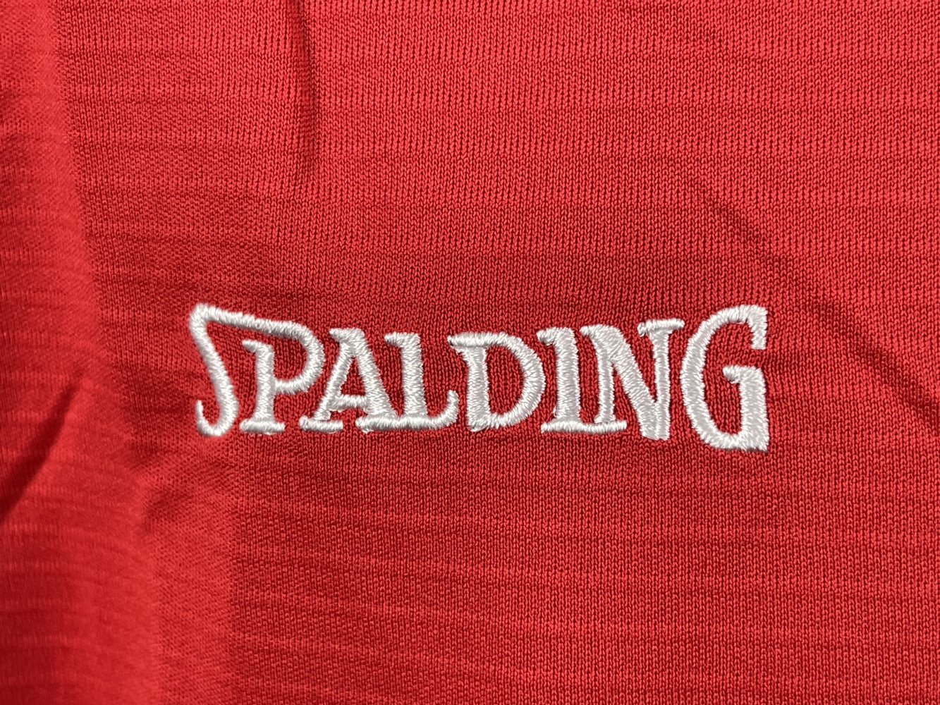 Rotes Spalding Trikot Größe XL