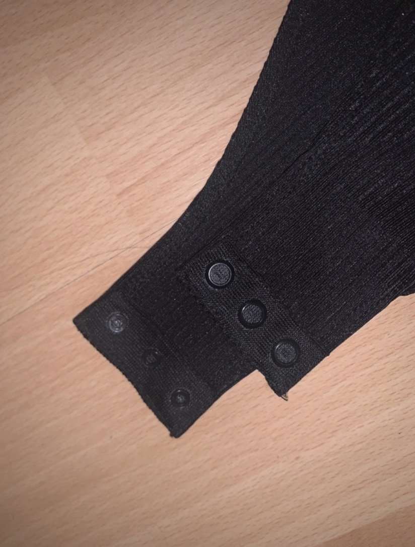 schwarzer langarmbody