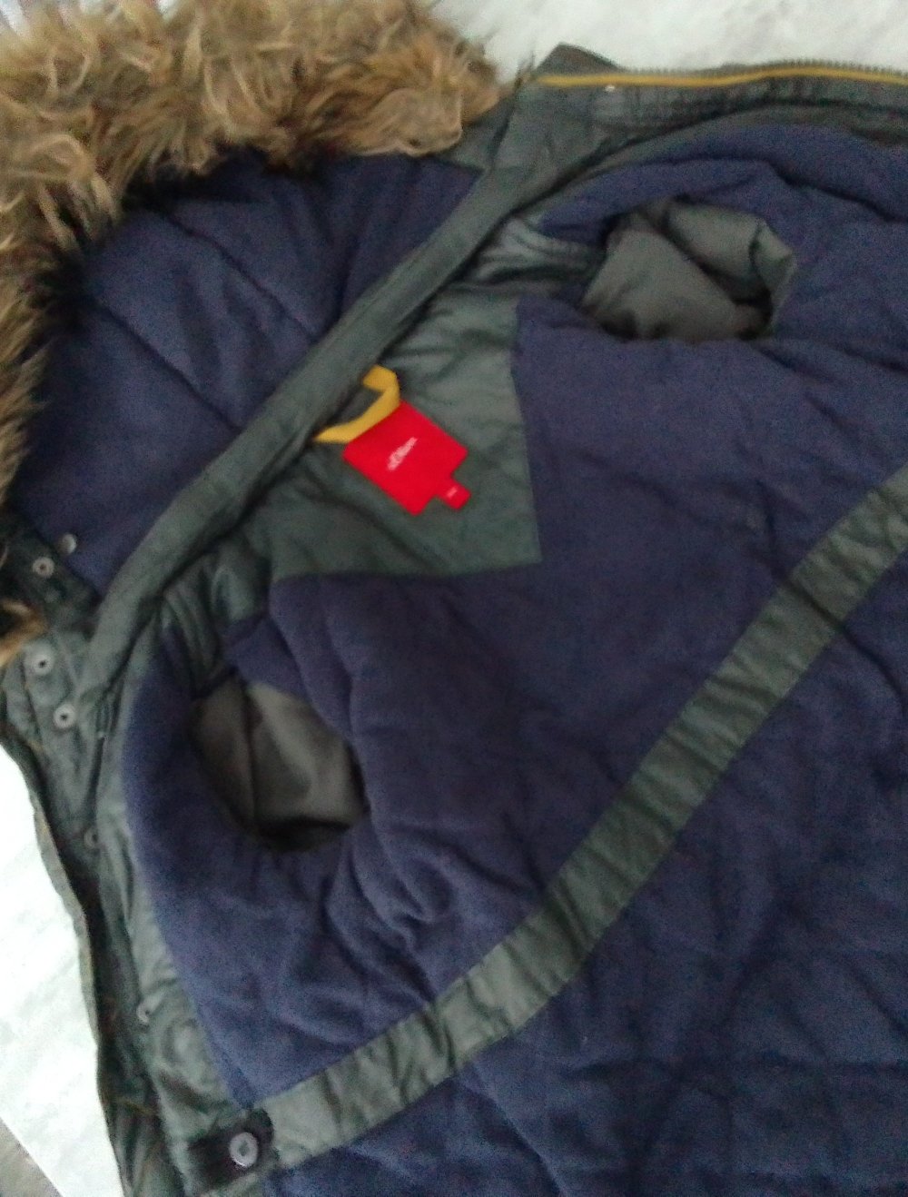 junge Winterjacke